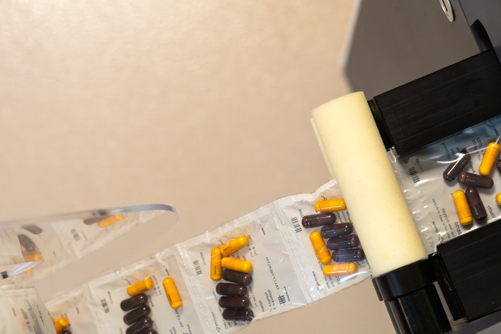 Daily sachets being filled and sealed on the production line