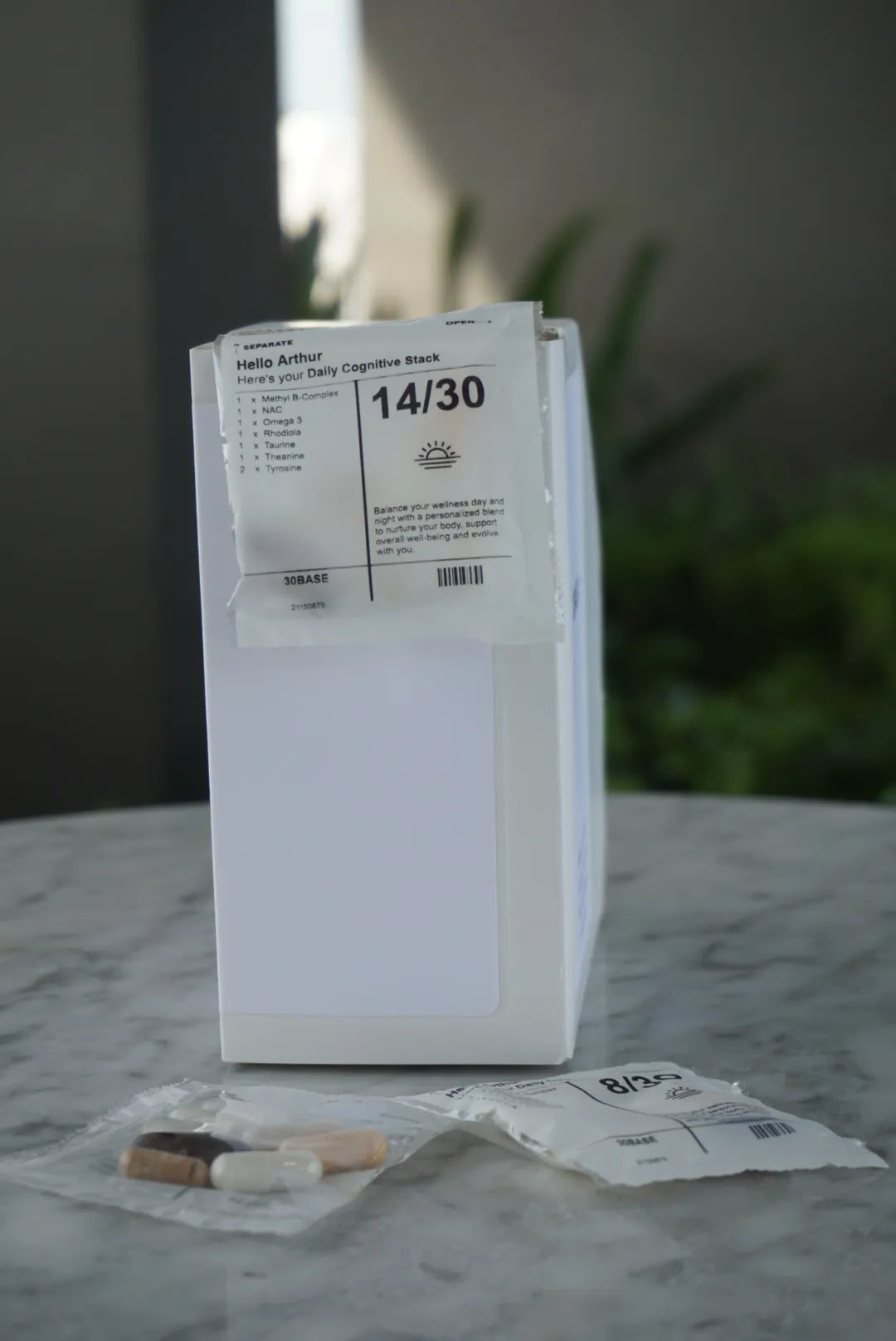 An open 30BASE box with the month of dated daily sachets.